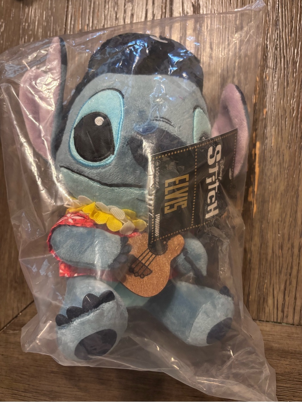Disney Light Blue Stitch Plush with Pink Ear Accents and Brown Ukulele